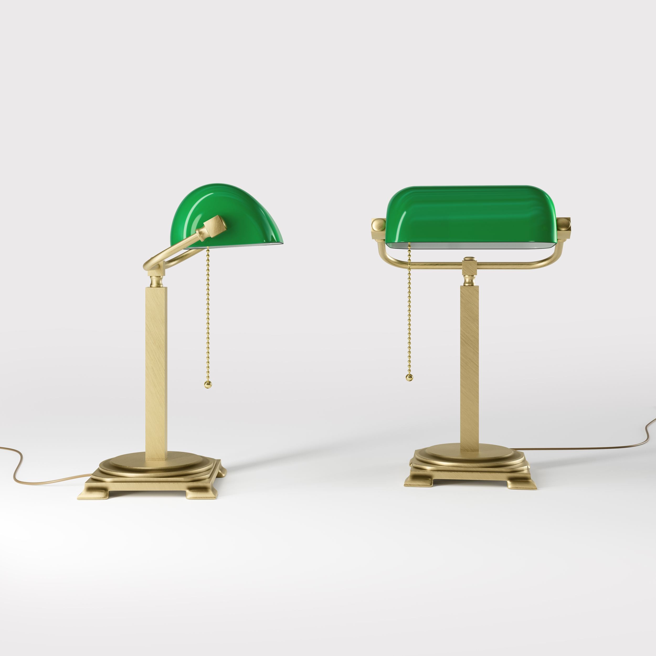 Executive library lamp with green glass shade and brass structure, decorative geometric base and golden pull chain by Ghidini 1849 - Finish: OBV Bronze Satin Light Brass