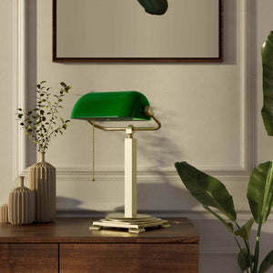 Executive library lamp with green glass shade and brass structure, decorative geometric base and golden pull chain by Ghidini 1849 - Finish: OBV Bronze Satin Light Brass