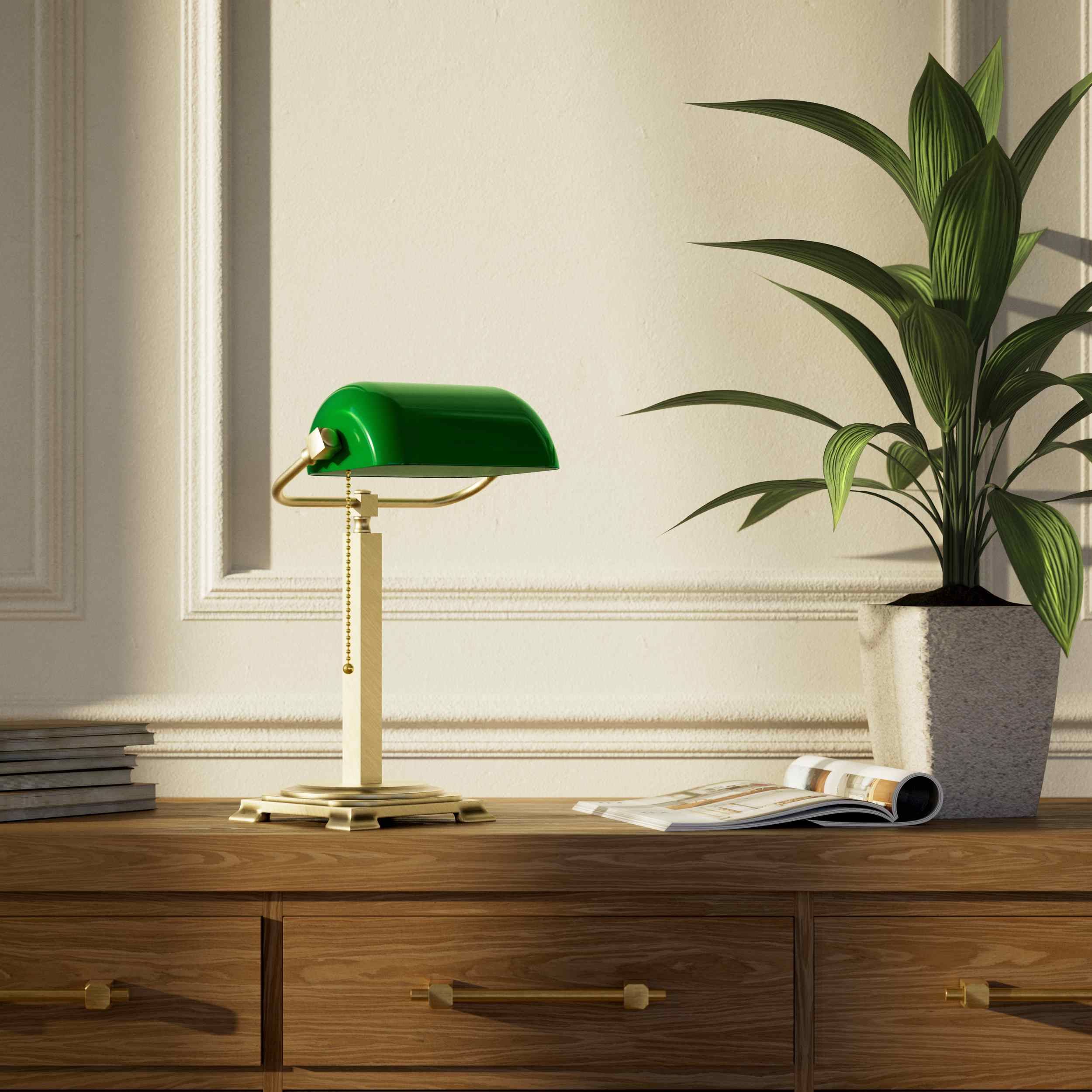 Executive library lamp with green glass shade and brass structure, decorative geometric base and golden pull chain by Ghidini 1849 - Finish: OBV Bronze Satin Light Brass