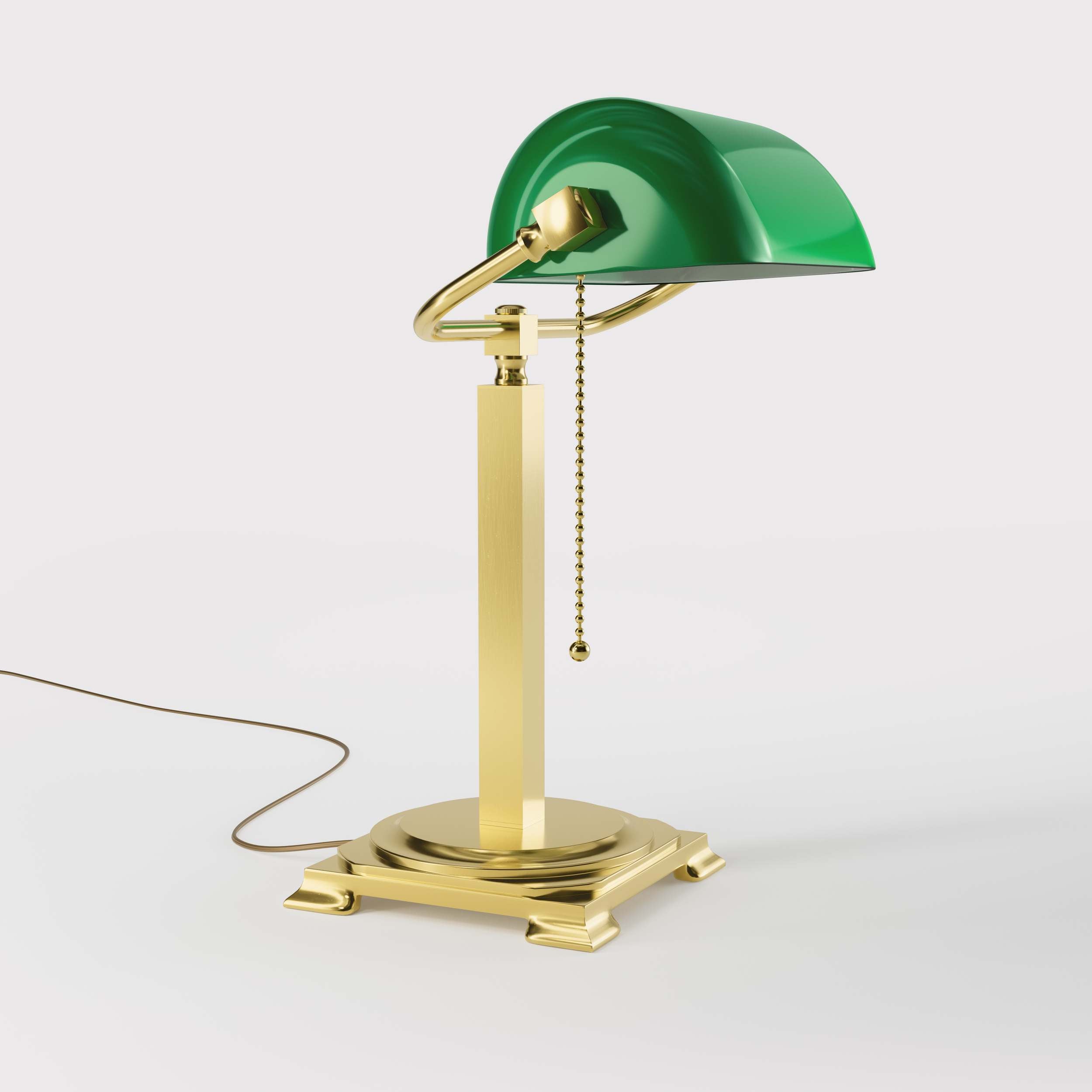 Executive library lamp with green glass shade and brass structure, decorative geometric base and golden pull chain by Ghidini 1849 - Finish: OLV Polished Brass