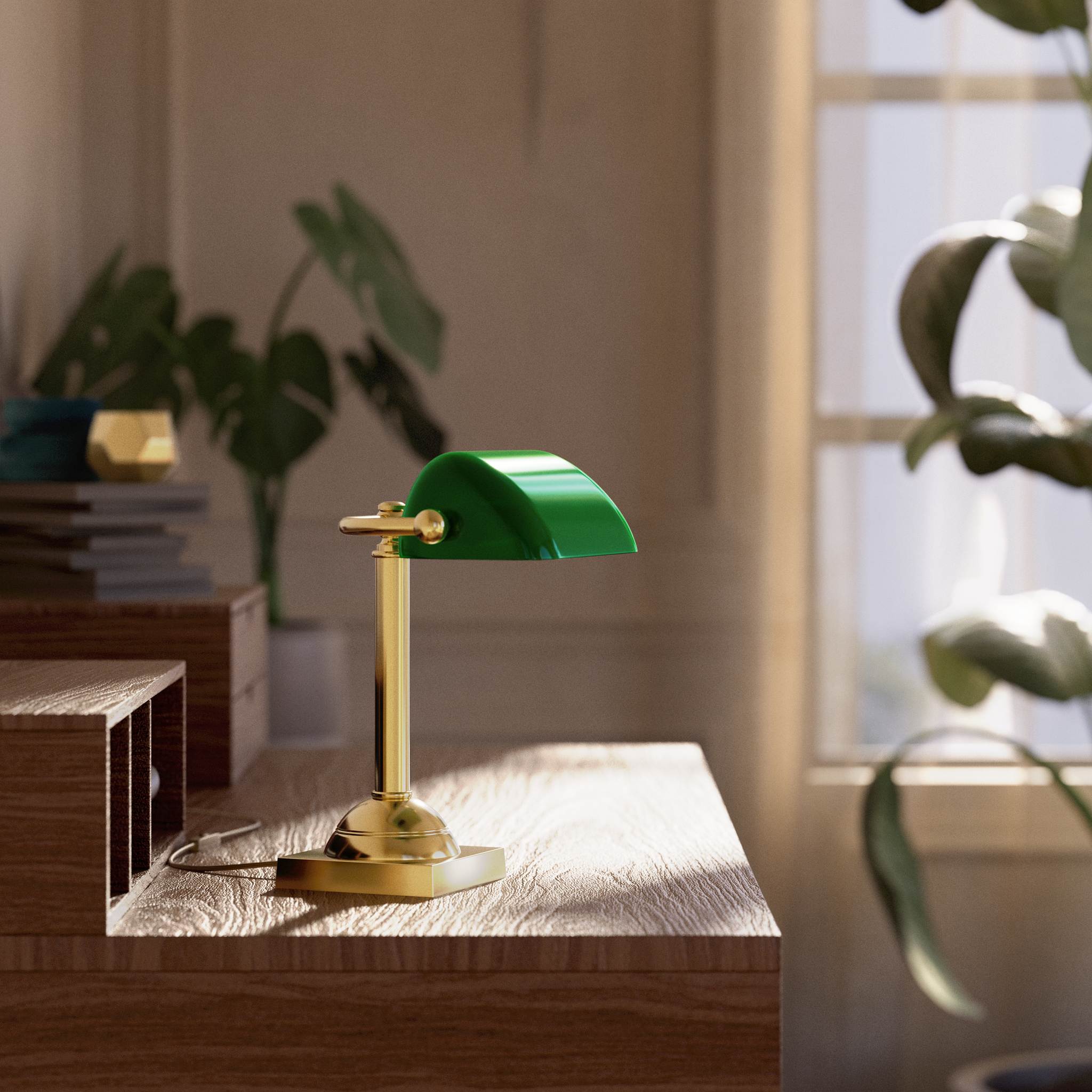 Compact banker's lamp with green glass shade and brass structure, square base and essential design by Ghidini 1849 - Finish: OLV Polished Brass