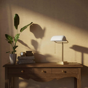 Banker's desk lamp with white glass shade and brass structure, geometric base and golden pull chain for operation by Ghidini 1849 - Finish: OBS Bronze Satin Brass