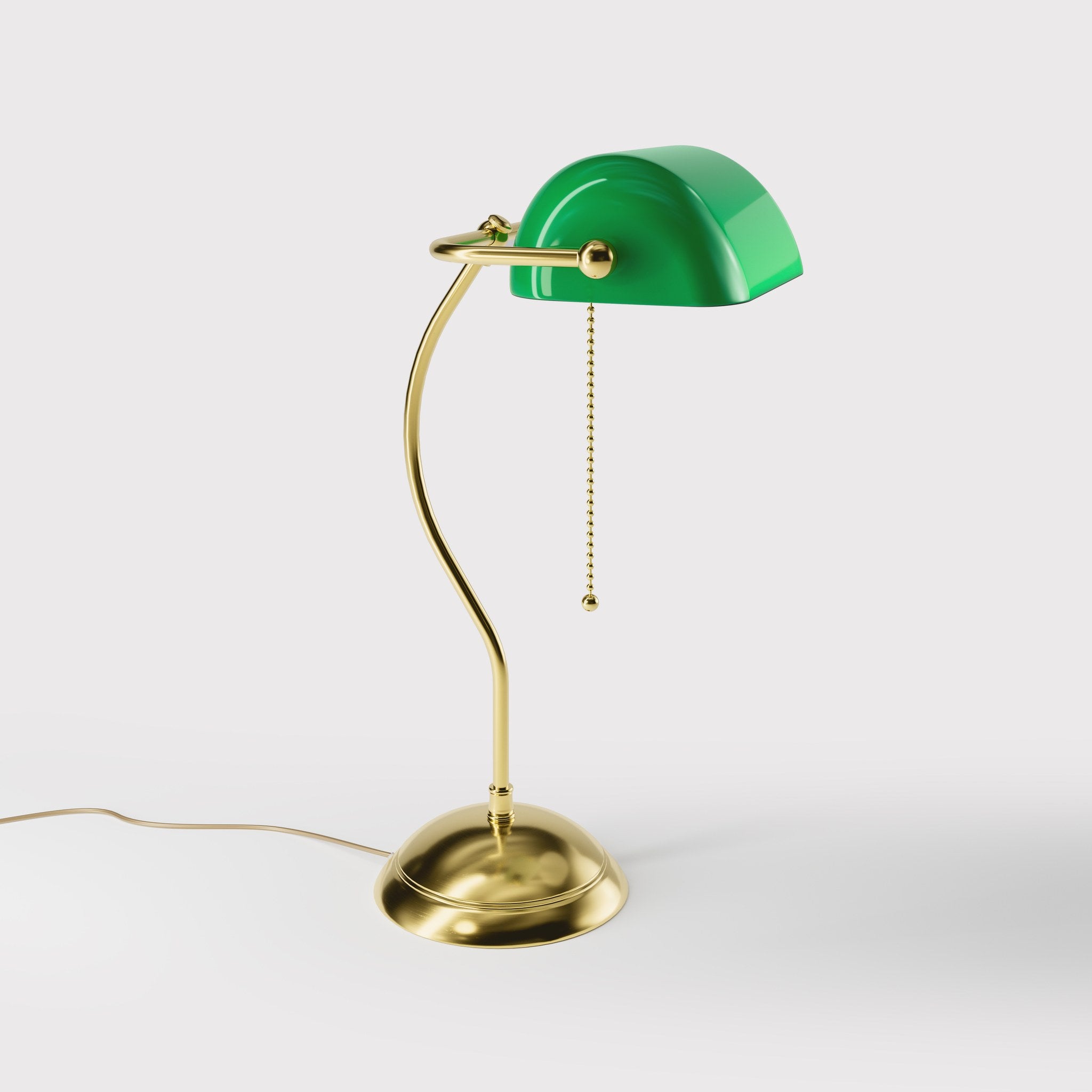 Banker's lamp with curved stem, green glass shade and domed brass base, golden pull chain for operation by Ghidini 1849 - Finish: OLV Polished Brass