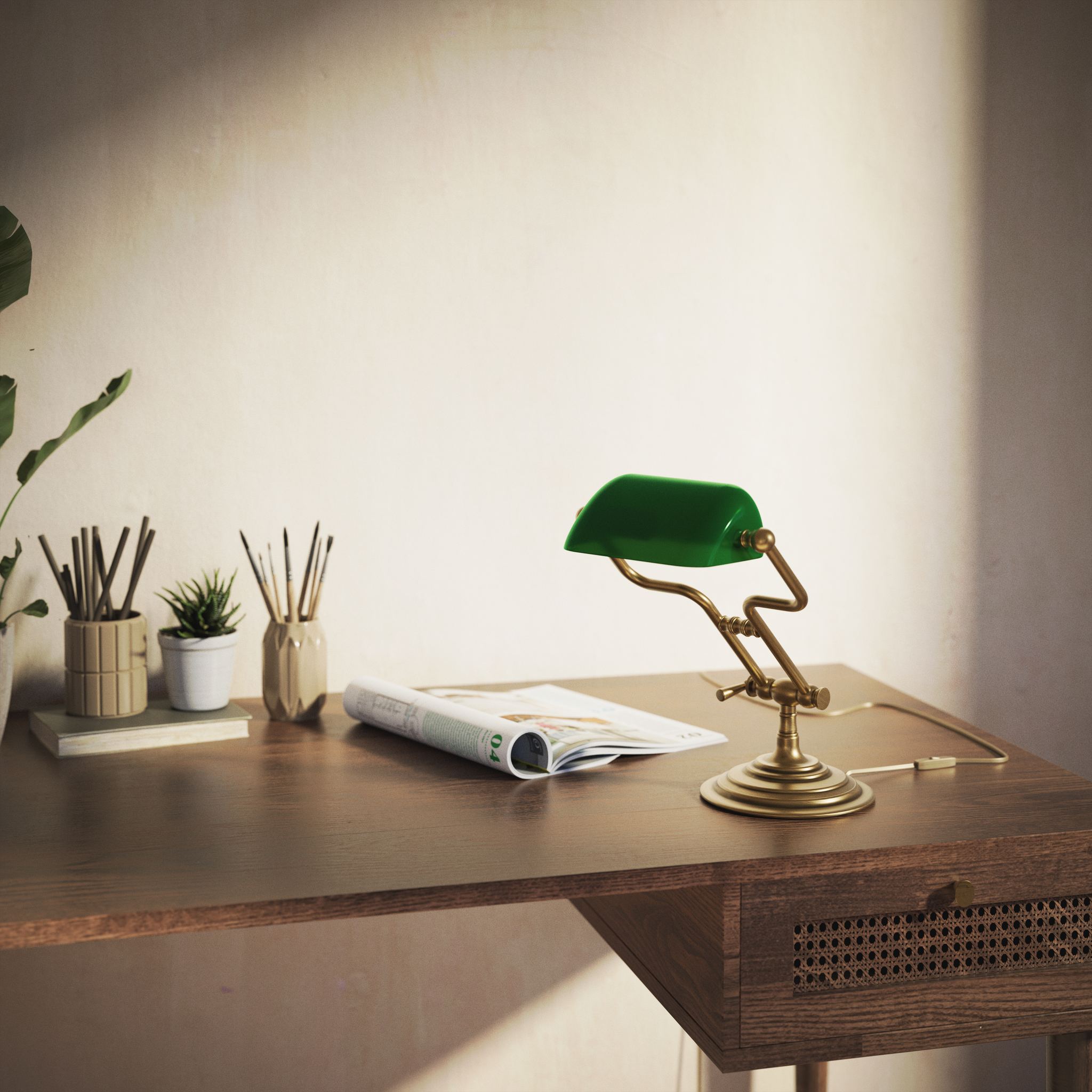 Small banker's lamp with green shade, adjustable brass arm and turned stepped base by Ghidini 1849 - Finish: OBS Bronze Satin Brass