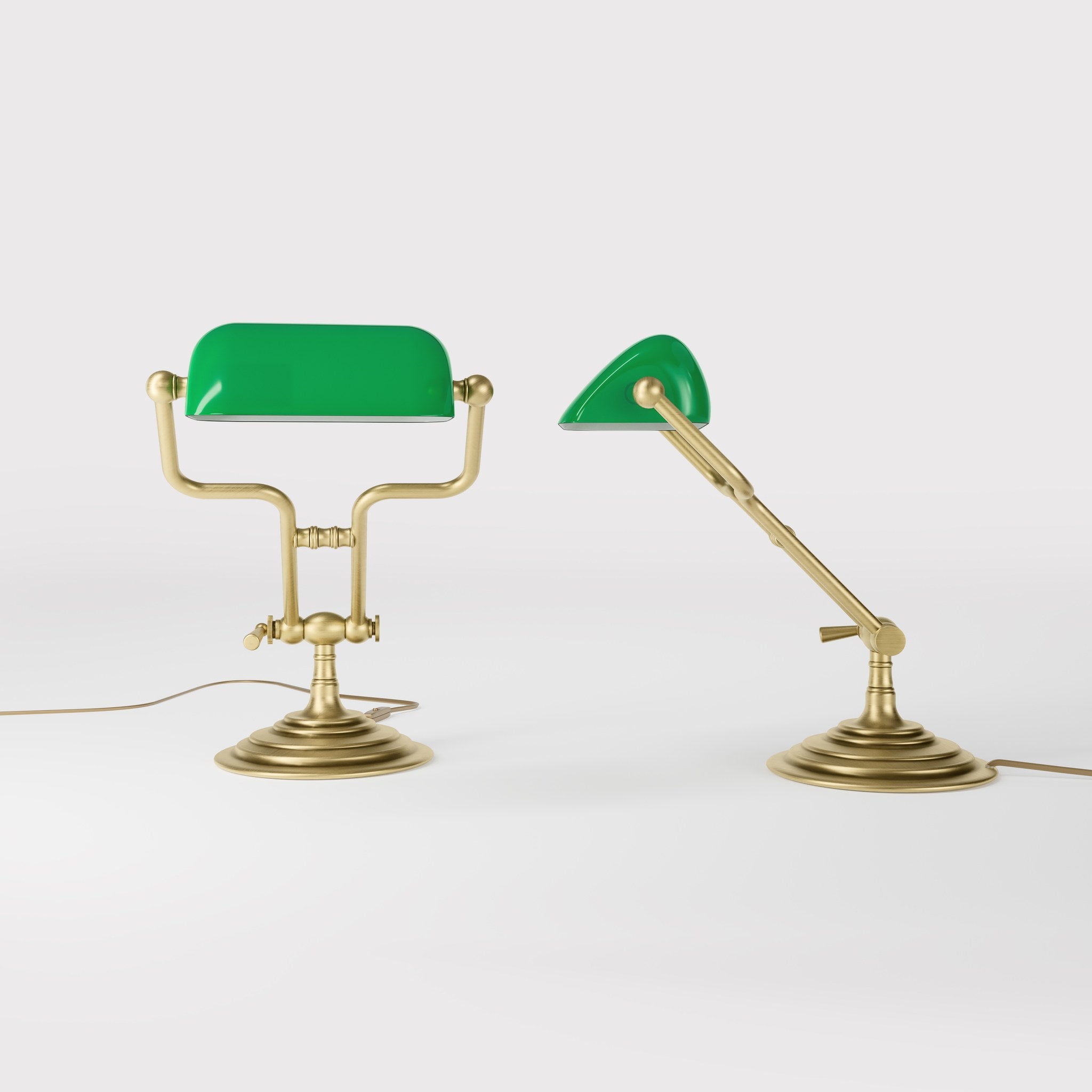 Small banker's lamp with green shade, adjustable brass arm and turned stepped base by Ghidini 1849 - Finish: OBV Bronze Satin Light Brass