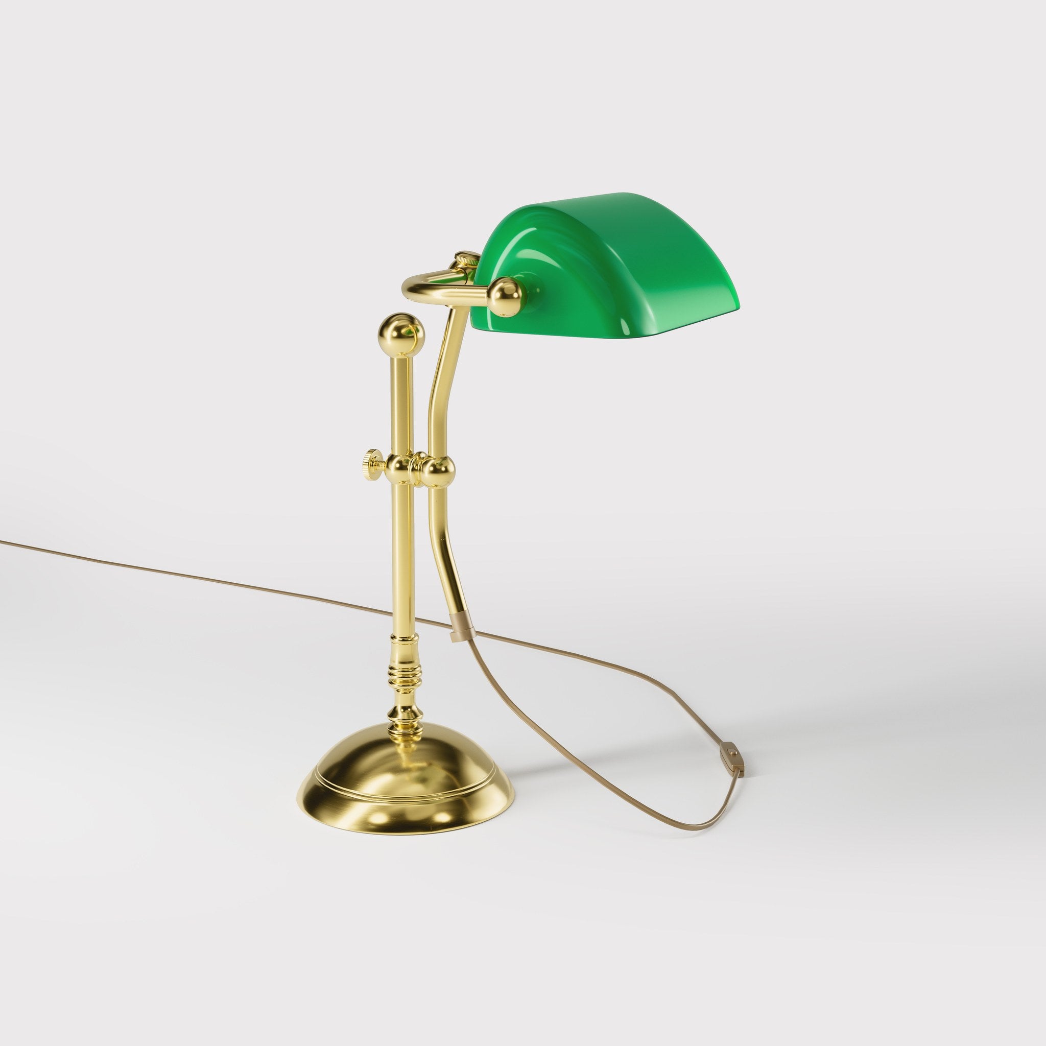 Compact banker's desk lamp with green shade, height-adjustable arm and brass structure by Ghidini 1849 | Finish: OLV Polished Brass