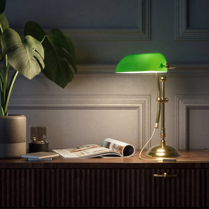 Compact banker's desk lamp with green shade, height-adjustable arm and brass structure by Ghidini 1849 | Finish: OLV Polished Brass