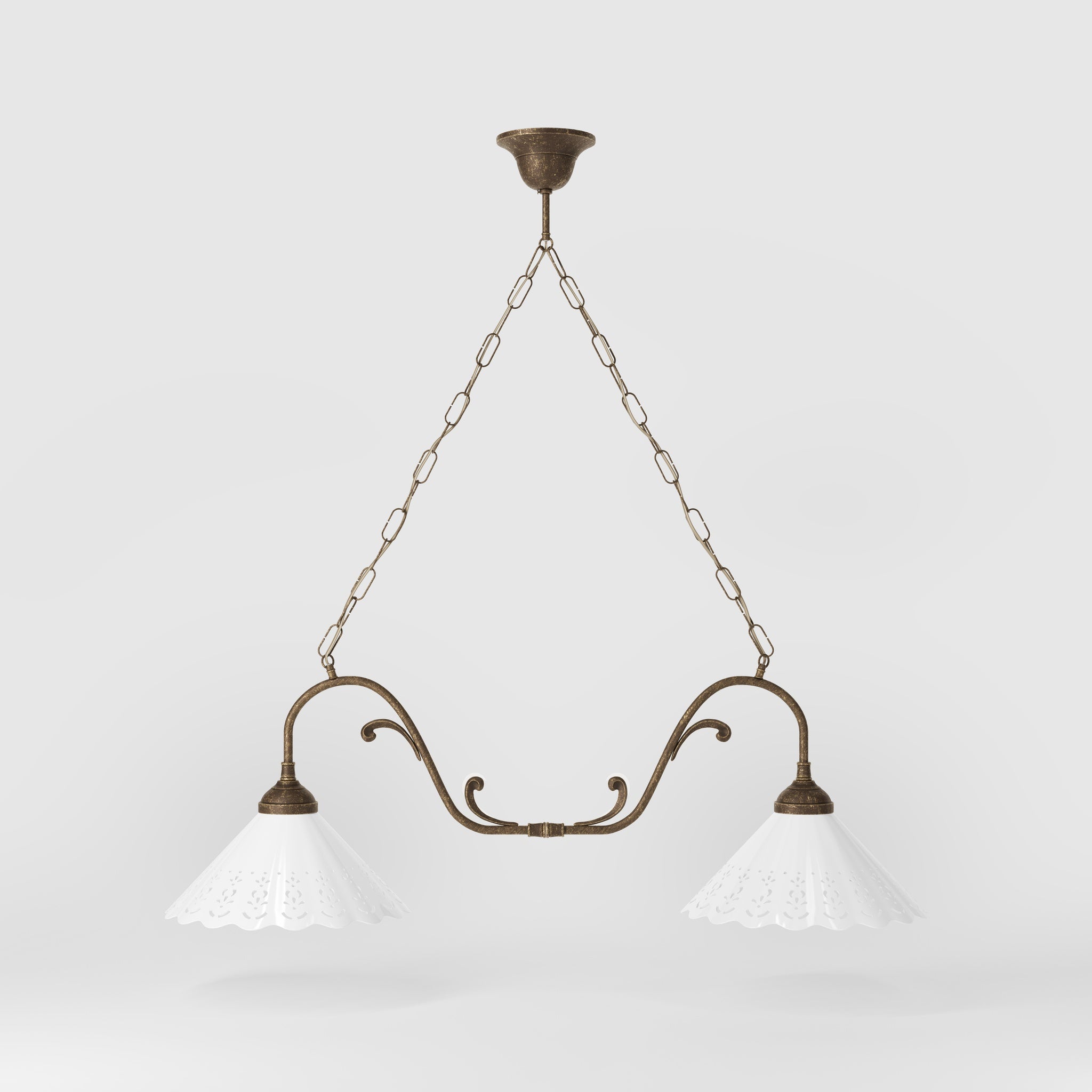 Art Nouveau pendant lamp with two pierced white ceramic shades, decorative brass arms and adjustable suspension chain by Ghidini 1849 - Finish: OAS Antique Brass