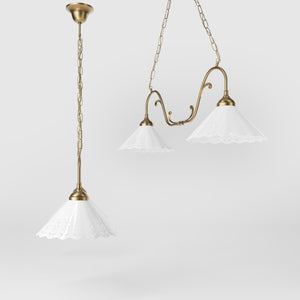 Art Nouveau pendant lamp with two pierced white ceramic shades, decorative brass arms and adjustable suspension chain by Ghidini 1849 - Finish: OBS Bronze Satin Brass