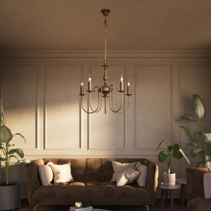 Classic five-light brass chandelier with intertwined arms and lamp holders decorated with dripping wax pattern by Ghidini 1849 - Finish: OAS Antique Brass