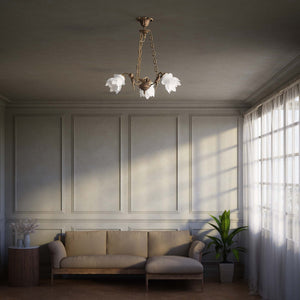 Art Nouveau chandelier with dancing brass putti and three frosted glass shades, decorated chains, floral motif rosette by Ghidini 1849 - Finish: OAS Antique Brass