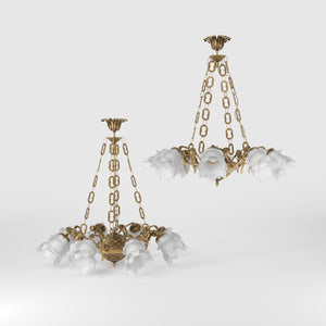 Art Nouveau chandelier with eight dancing brass putti, petal-shaped frosted glass shades, decorated chains and floral rosette by Ghidini 1849 - Finish: OBS Bronze Satin Brass