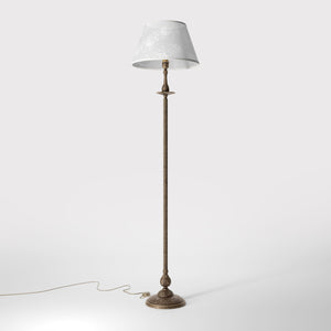 Classic brass floor lamp with decorated white fabric shade fluted stem ornamental base floral details traditional style - Finish: OAS Antique Brass