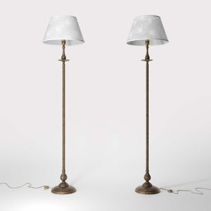 Classic brass floor lamp with decorated white fabric shade fluted stem ornamental base floral details traditional style - Finish: OAS Antique Brass