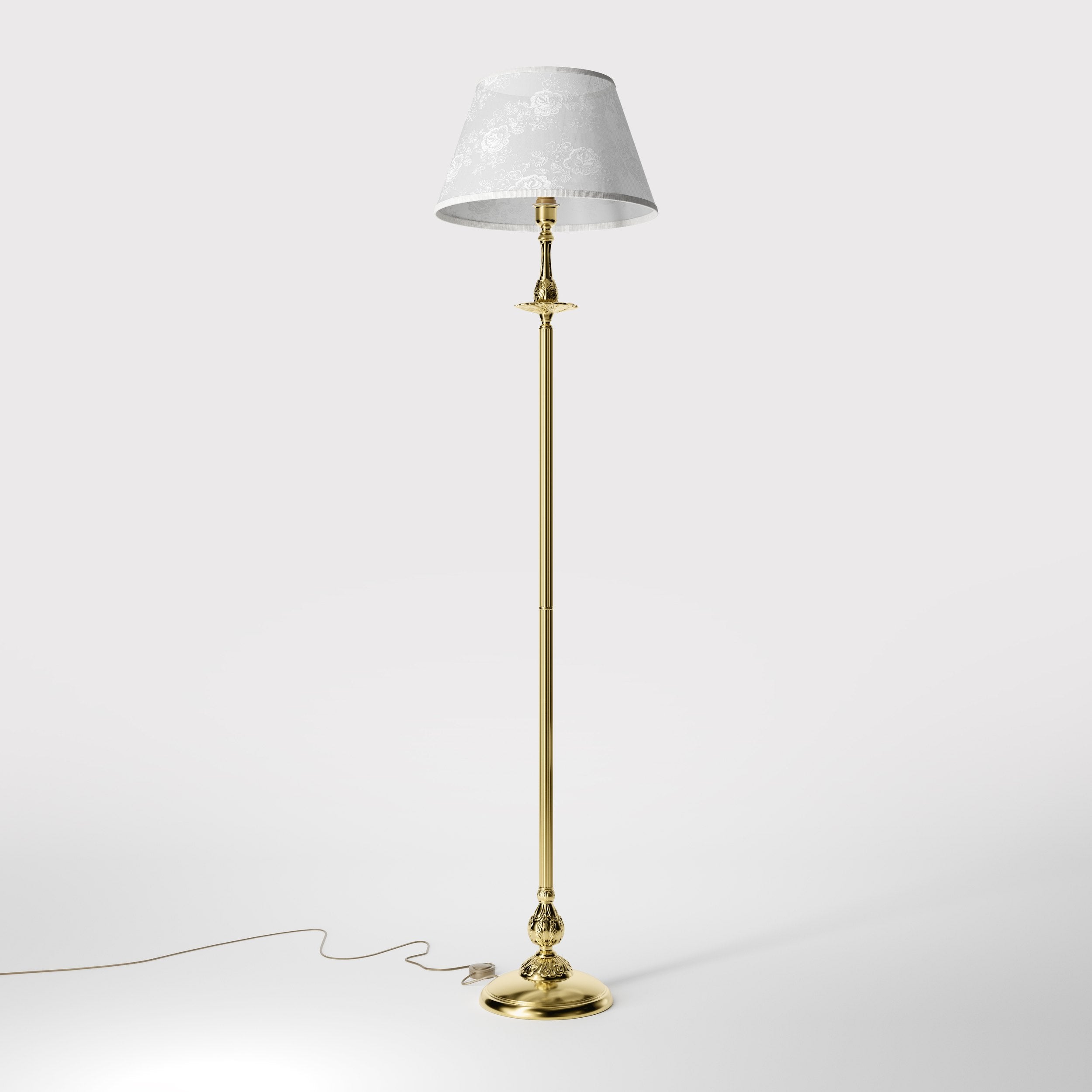 Classic brass floor lamp with decorated white fabric shade fluted stem ornamental base floral details traditional style - Finish: OLV Polished Brass