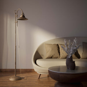 Industrial brass floor lamp with adjustable arm and swivel conical shade for targeted lighting by Ghidini 1849 - Finish: OAS Antique Brass
