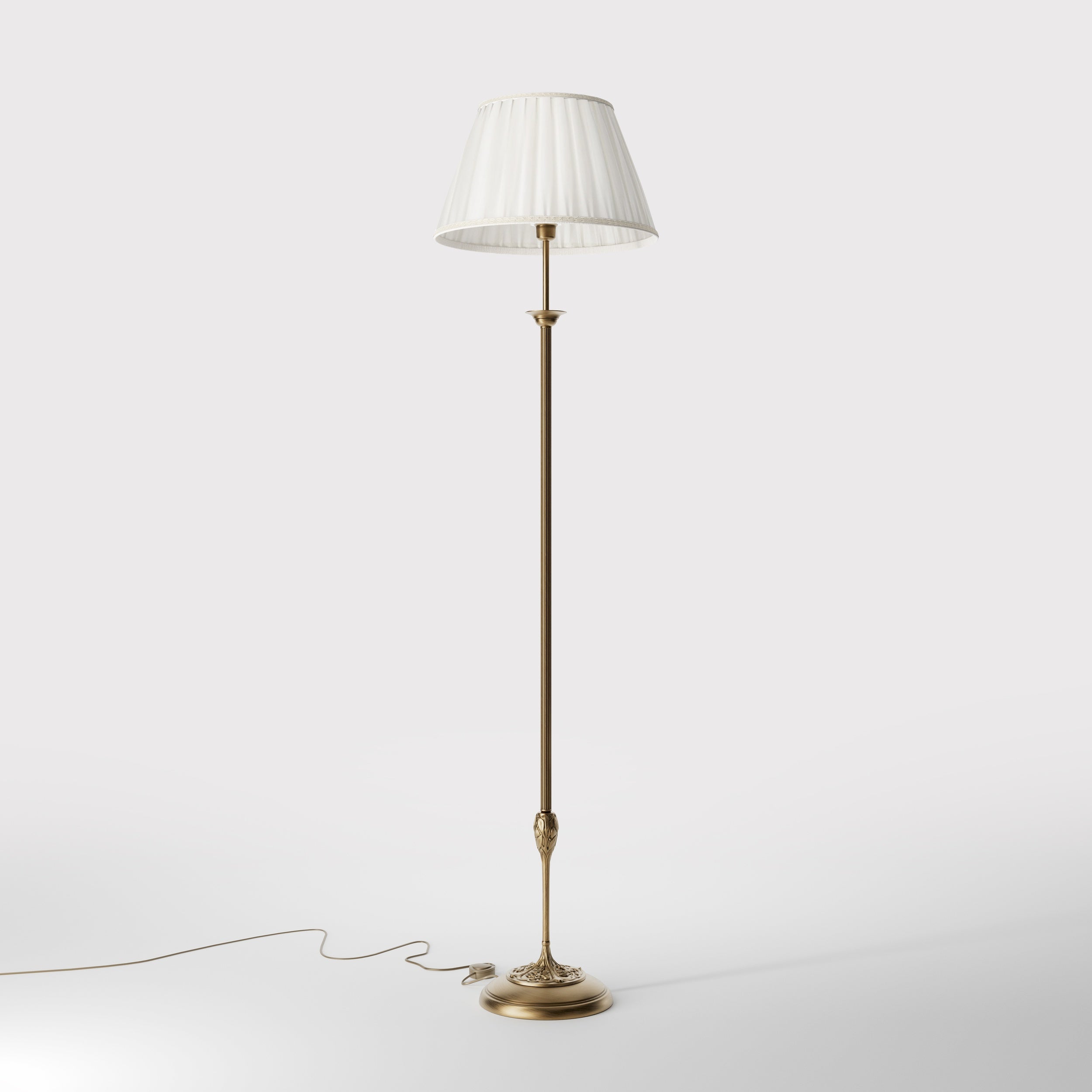Classic floor lamp Simona collection with decorated brass stem and large pleated ivory white fabric lampshade on ornamental base by Ghidini 1849 - Finish: OBS Bronze Satin Brass