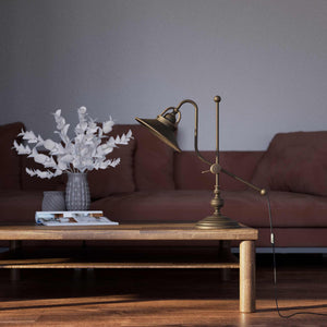 Classic brass table lamp with adjustable swing arm and decorative turned base, directional conical shade by Ghidini 1849 - Finish: OBM Bronze Satin Matt Brass