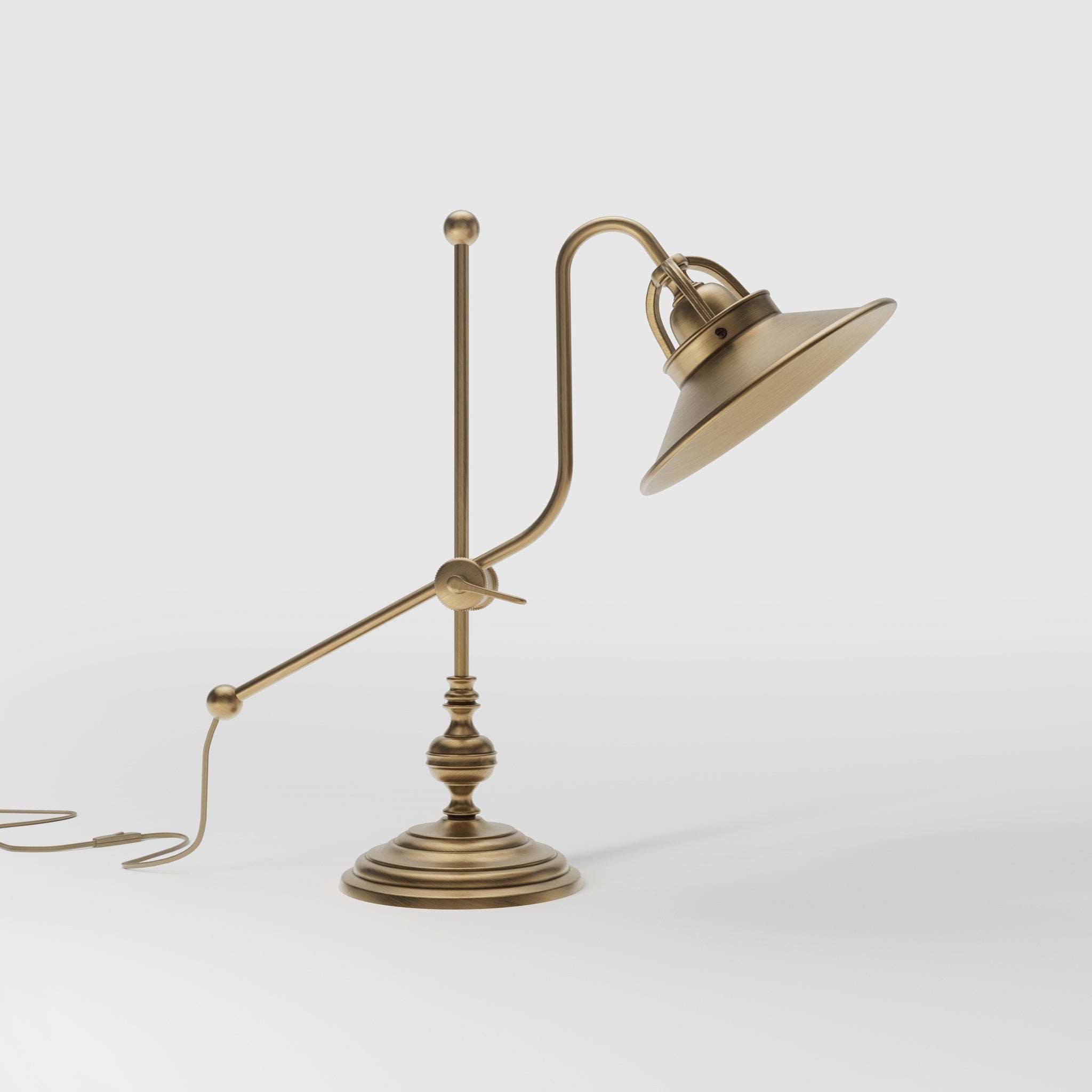 Classic brass table lamp with adjustable swing arm and decorative turned base, directional conical shade by Ghidini 1849 - Finish: OBS Bronze Satin Brass