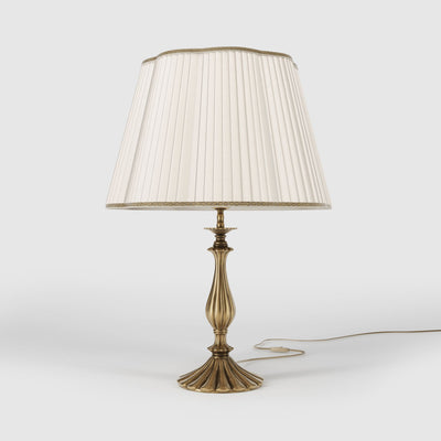 Classic brass table lamp with ivory pleated shade, shaped base and elegant decorations, Petalo collection Made in Italy by Ghidini 1849 - Finish: OBS Bronze Satin Brass