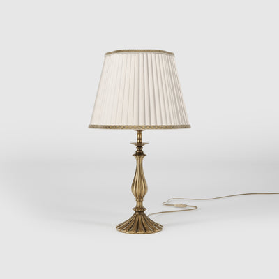 Brass table lamp with fan-shaped base and pleated fabric shade with decorative trim from Petalo collection by Ghidini 1849 - Finish: OBS Bronze Satin Brass