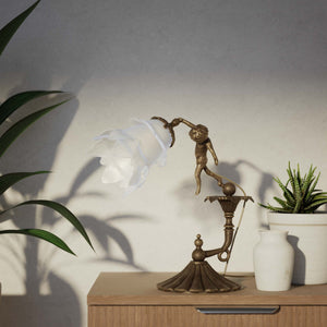 Art Nouveau table lamp with dancing brass putto, petal-shaped frosted glass shade, fan-decorated base by Ghidini 1849 - Finish: OAS Antique Brass