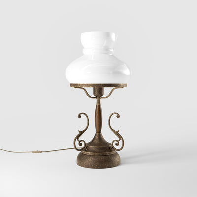 Victorian style table lamp with decorative scrolls, turned wooden column and white glass dome shade from the Mississippi collection by Ghidini 1849 - Finish: OAS Antique Brass