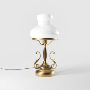 Victorian style table lamp with decorative scrolls, turned wooden column and white glass dome shade from the Mississippi collection by Ghidini 1849 - Finish: OBS Bronze Satin Brass