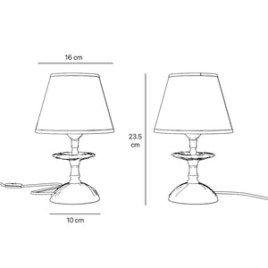 Classic brass table lamp with embroidered white shade decorated base floral motifs traditional style