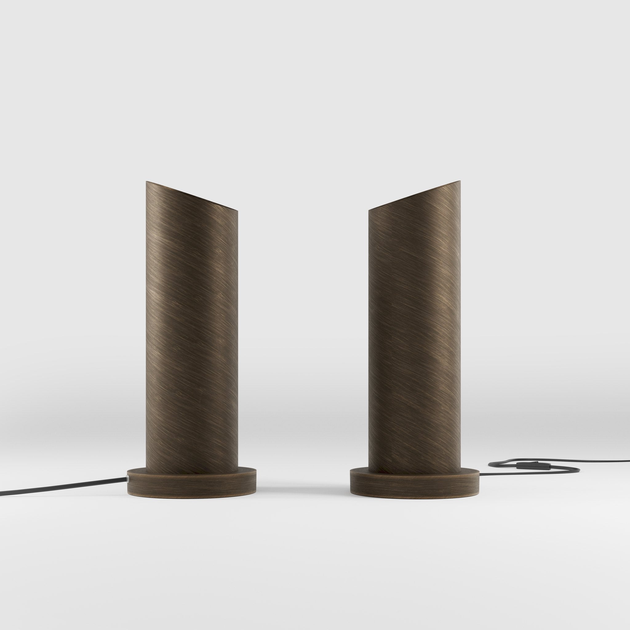 Brass table lamp with a sleek cylindrical shape and circular base, ideal for contemporary and elegant interiors by Ghidini 1849 - Finish: OBM Bronze Satin Matt Brass