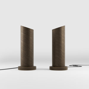 Brass table lamp with a sleek cylindrical shape and circular base, ideal for contemporary and elegant interiors by Ghidini 1849 - Finish: OBM Bronze Satin Matt Brass