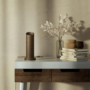 Brass table lamp with a sleek cylindrical shape and circular base, ideal for contemporary and elegant interiors by Ghidini 1849 - Finish: OBM Bronze Satin Matt Brass