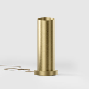 Brass table lamp with a sleek cylindrical shape and circular base, ideal for contemporary and elegant interiors by Ghidini 1849 - Finish: OBV Bronze Satin Light Brass