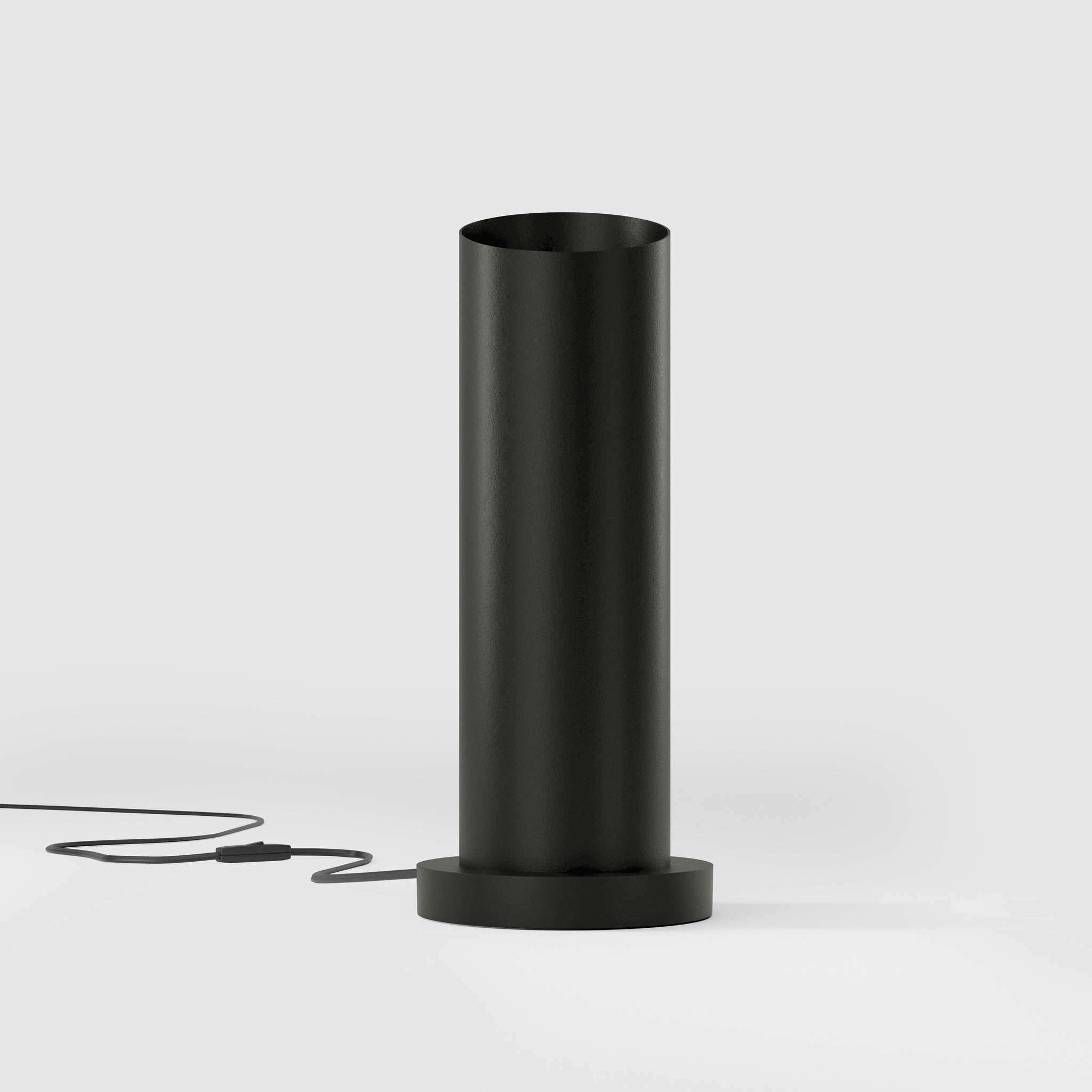 Brass table lamp with a sleek cylindrical shape and circular base, ideal for contemporary and elegant interiors by Ghidini 1849 - Finish: ONO Matt Black