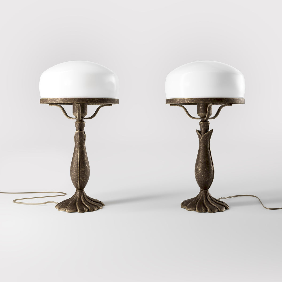 Art Deco table lamp with glossy white mushroom glass shade, sculpted brass base with undulating motifs, Italian design by Ghidini 1849 - Finish: OAS Antique Brass