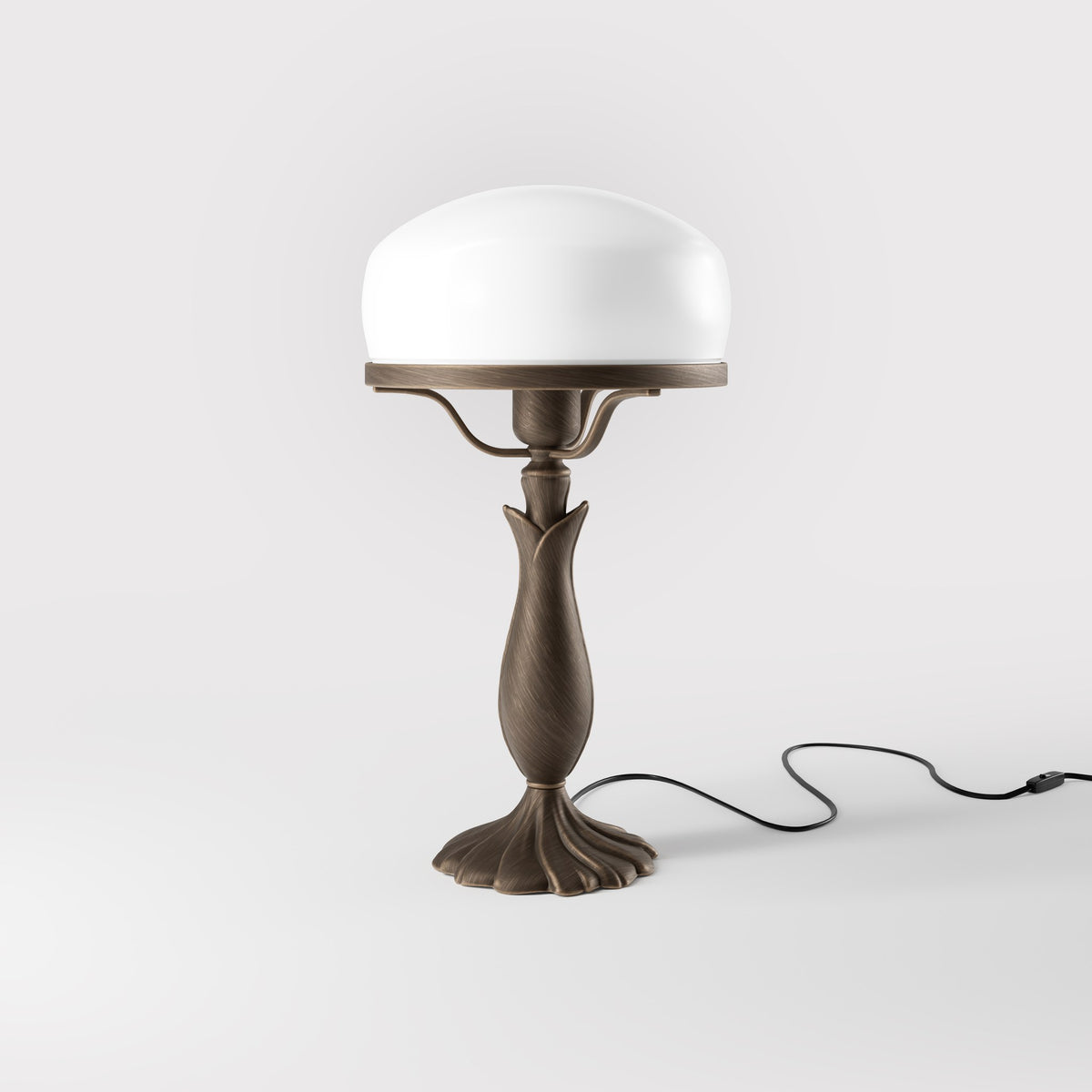 Art Deco table lamp with glossy white mushroom glass shade, sculpted brass base with undulating motifs, Italian design by Ghidini 1849 - Finish: OBM Bronze Satin Matt Brass