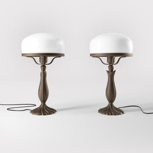 Art Deco table lamp with glossy white mushroom glass shade, sculpted brass base with undulating motifs, Italian design by Ghidini 1849 - Finish: OBM Bronze Satin Matt Brass