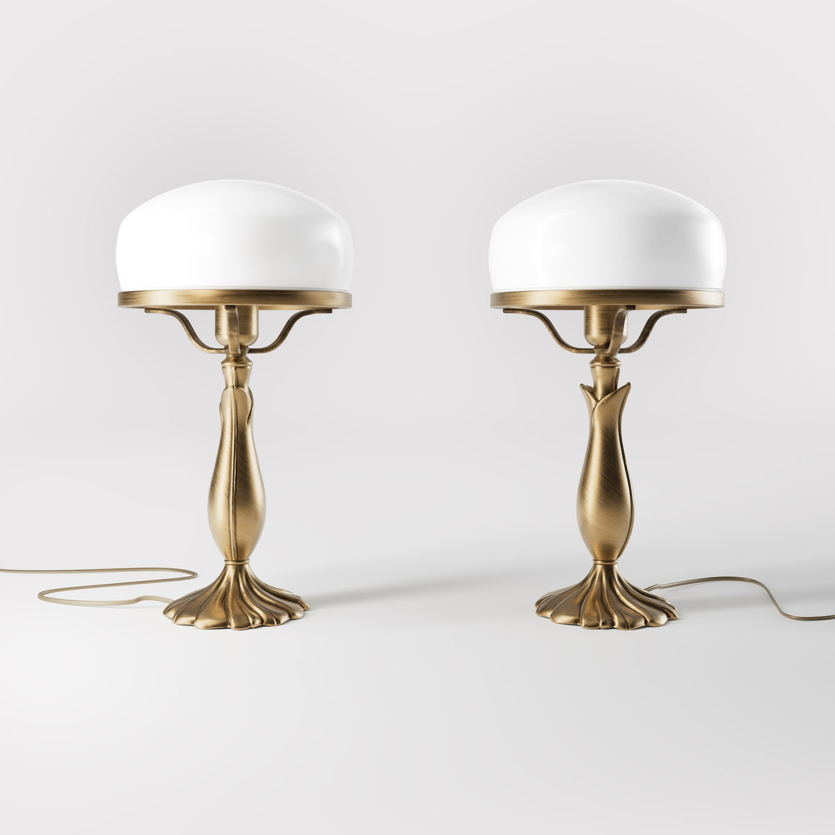 Art Deco table lamp with glossy white mushroom glass shade, sculpted brass base with undulating motifs, Italian design by Ghidini 1849 - Finish: OBS Bronze Satin Brass
