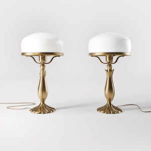 Art Deco table lamp with glossy white mushroom glass shade, sculpted brass base with undulating motifs, Italian design by Ghidini 1849 - Finish: OBS Bronze Satin Brass