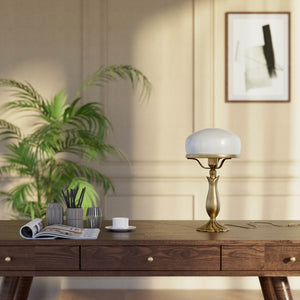Art Deco table lamp with glossy white mushroom glass shade, sculpted brass base with undulating motifs, Italian design by Ghidini 1849 - Finish: OBS Bronze Satin Brass