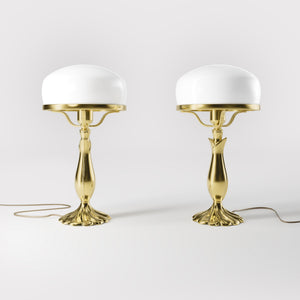 Art Deco table lamp with glossy white mushroom glass shade, sculpted brass base with undulating motifs, Italian design by Ghidini 1849 - Finish: OLV Polished Brass