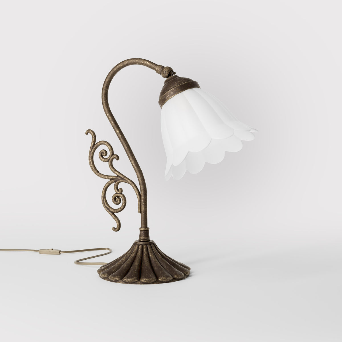 Art Deco table lamp with glossy white mushroom glass shade, sculpted brass base with undulating motifs, Italian design by Ghidini 1849 - Finish: OAS Antique Brass