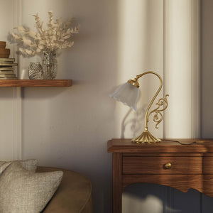 Art Deco table lamp with glossy white mushroom glass shade, sculpted brass base with undulating motifs, Italian design by Ghidini 1849 - Finish: OLV Polished Brass
