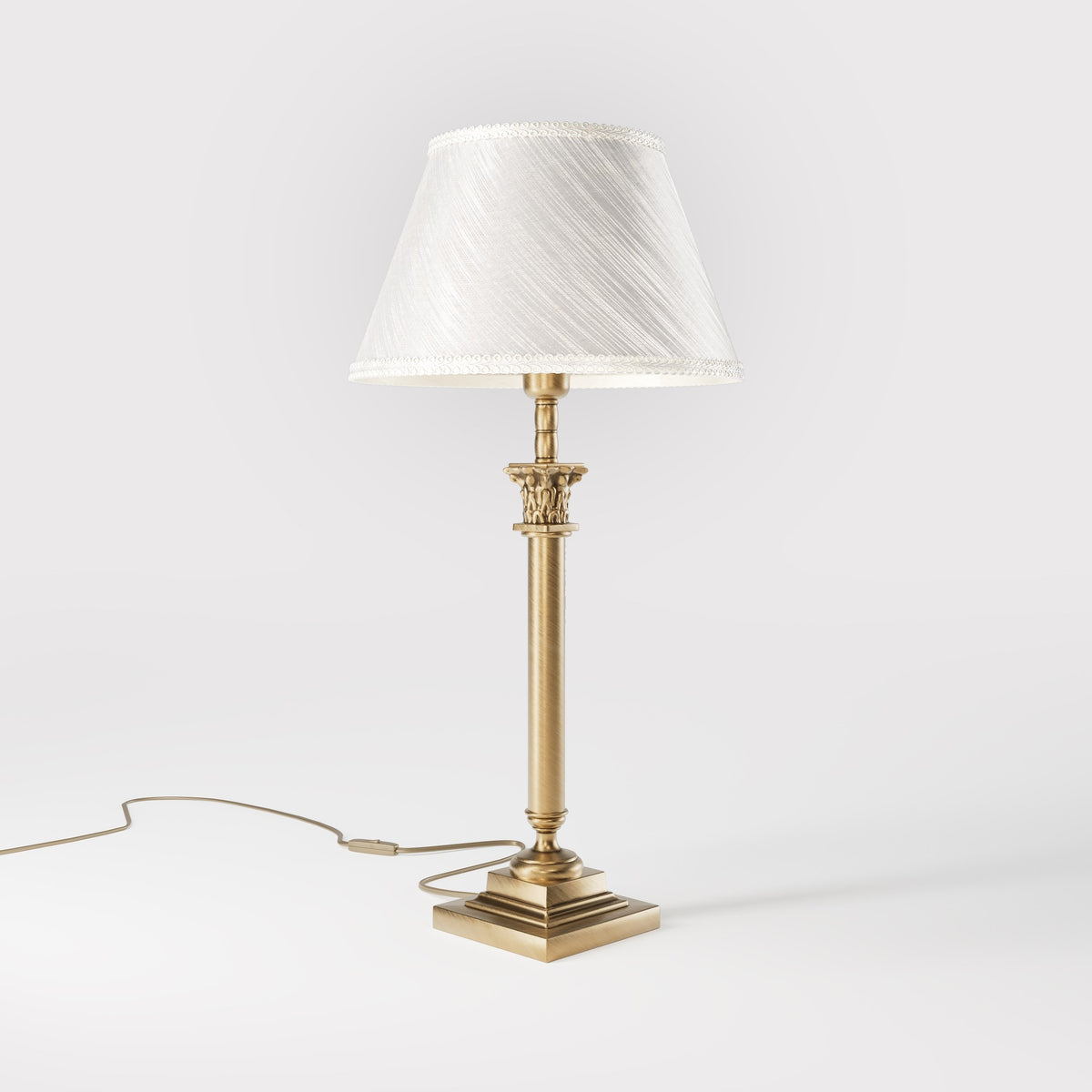 Brass table lamp with classic fabric shade in ivory white, decorative capital detail, ideal for elegant and timeless interiors by Ghidini 1849 - Finish: OBS Bronze Satin Brass