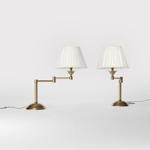 Table lamp with double adjustable arm, ivory pleated fabric shade and circular base - Finish: OBS Bronze Satin Brass