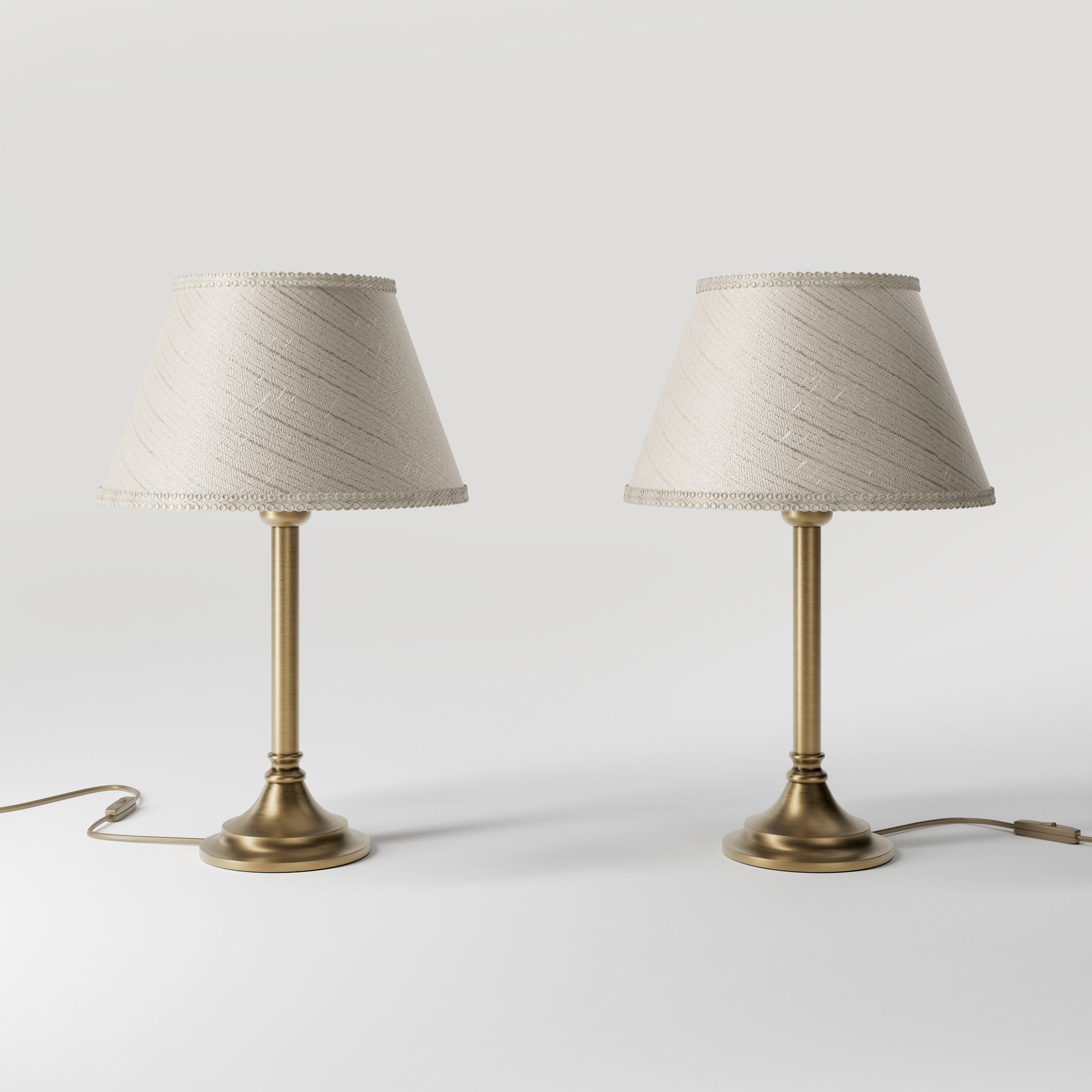 Brass table lamp with an ivory striped fabric shade, Made in Italy, timeless design by Ghidini 1849