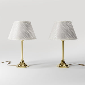 Brass table lamp with an ivory striped fabric shade, Made in Italy, timeless design by Ghidini 1849
