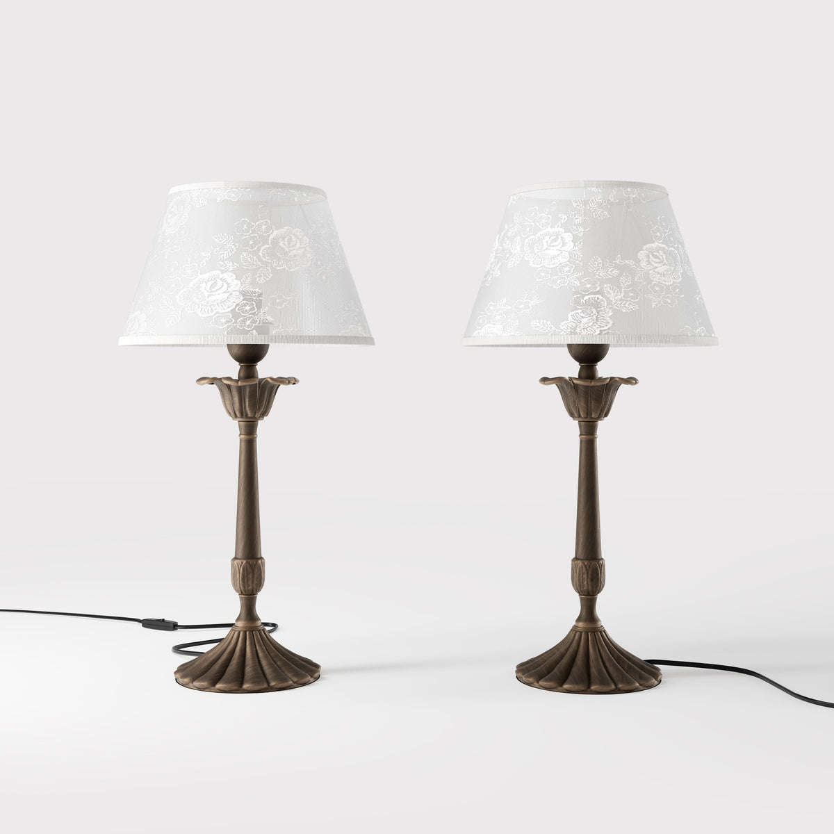 Classic brass table lamp with white fabric shade decorated with floral patterns, sculpted base with decorative elements by Ghidini 1849 - Finish: OBM Bronze Satin Matt Brass
