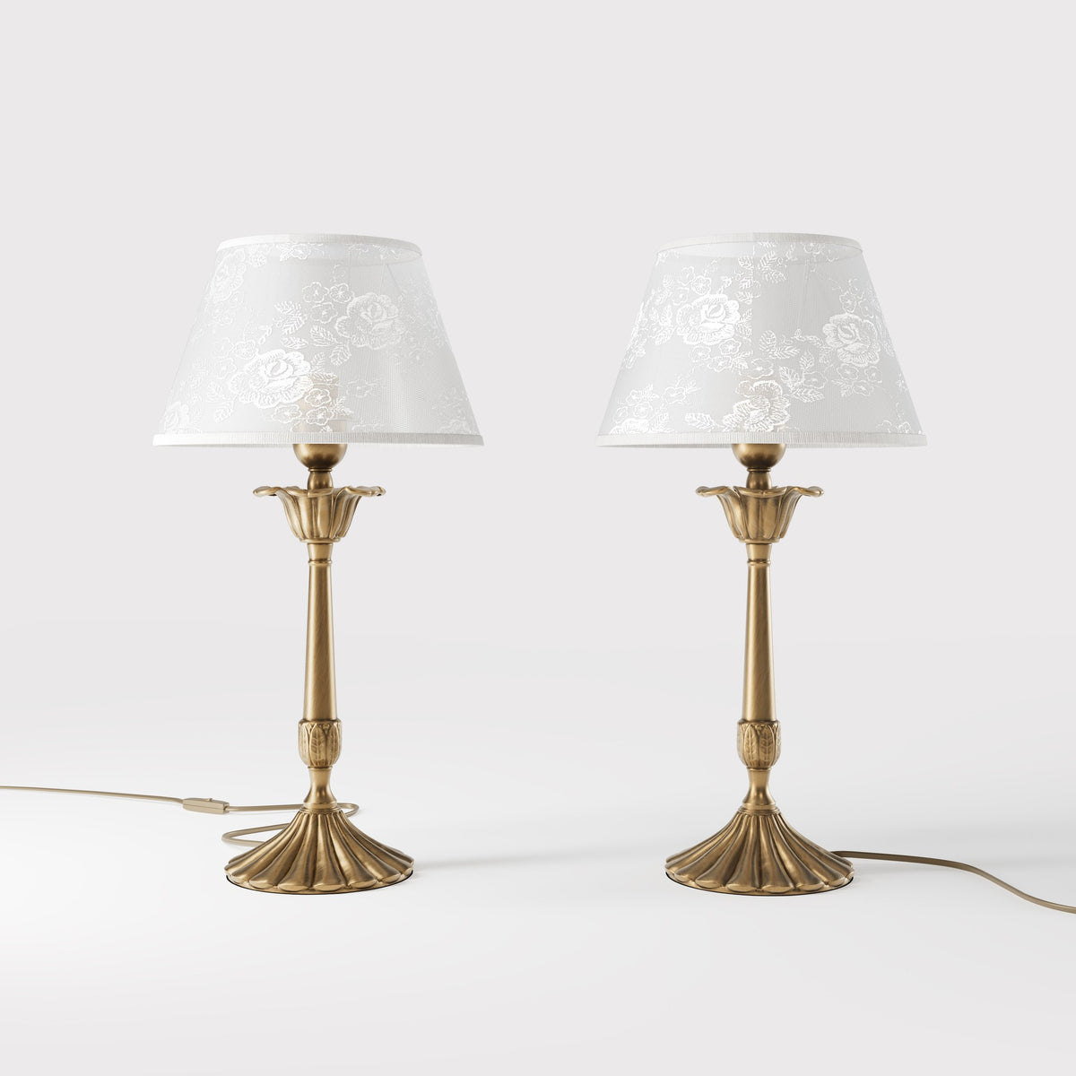 Classic brass table lamp with white fabric shade decorated with floral patterns, sculpted base with decorative elements by Ghidini 1849 - Finish: OBS Bronze Satin Brass
