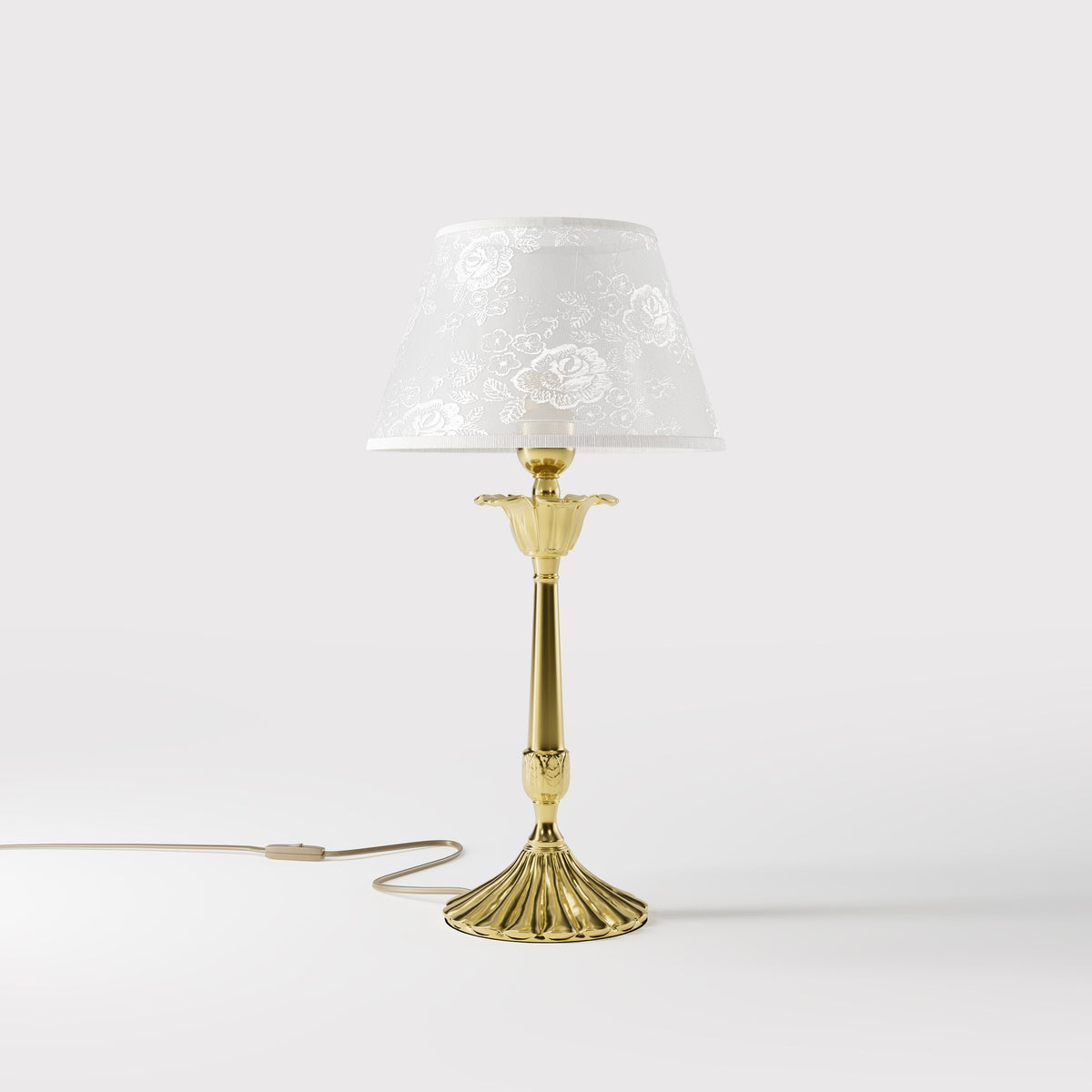 Classic brass table lamp with white fabric shade decorated with floral patterns, sculpted base with decorative elements by Ghidini 1849 - Finish: OLV Polished Brass